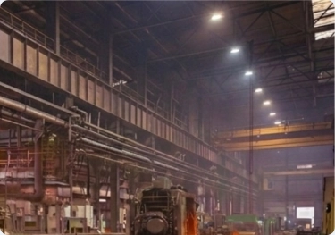 Presstrade technician performing maintenance on a forging machine