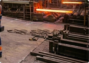 Presstrade technician performing maintenance on a forging machine